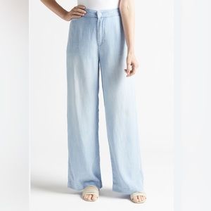 The softest pants you can imagine!  Lightweight, flowy, elastic band.